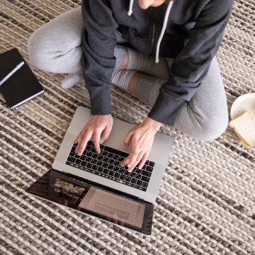 Person sending fax on their laptop